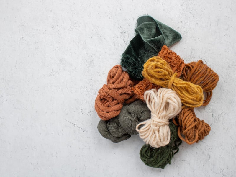 pile of yarn and fabrics